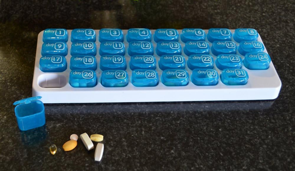 31-day-monthly-pill-organizer-with-pop-o-6.jpg